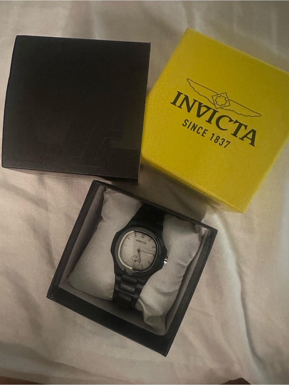 Invicta Black Watch with White Dial and Black Bracelet